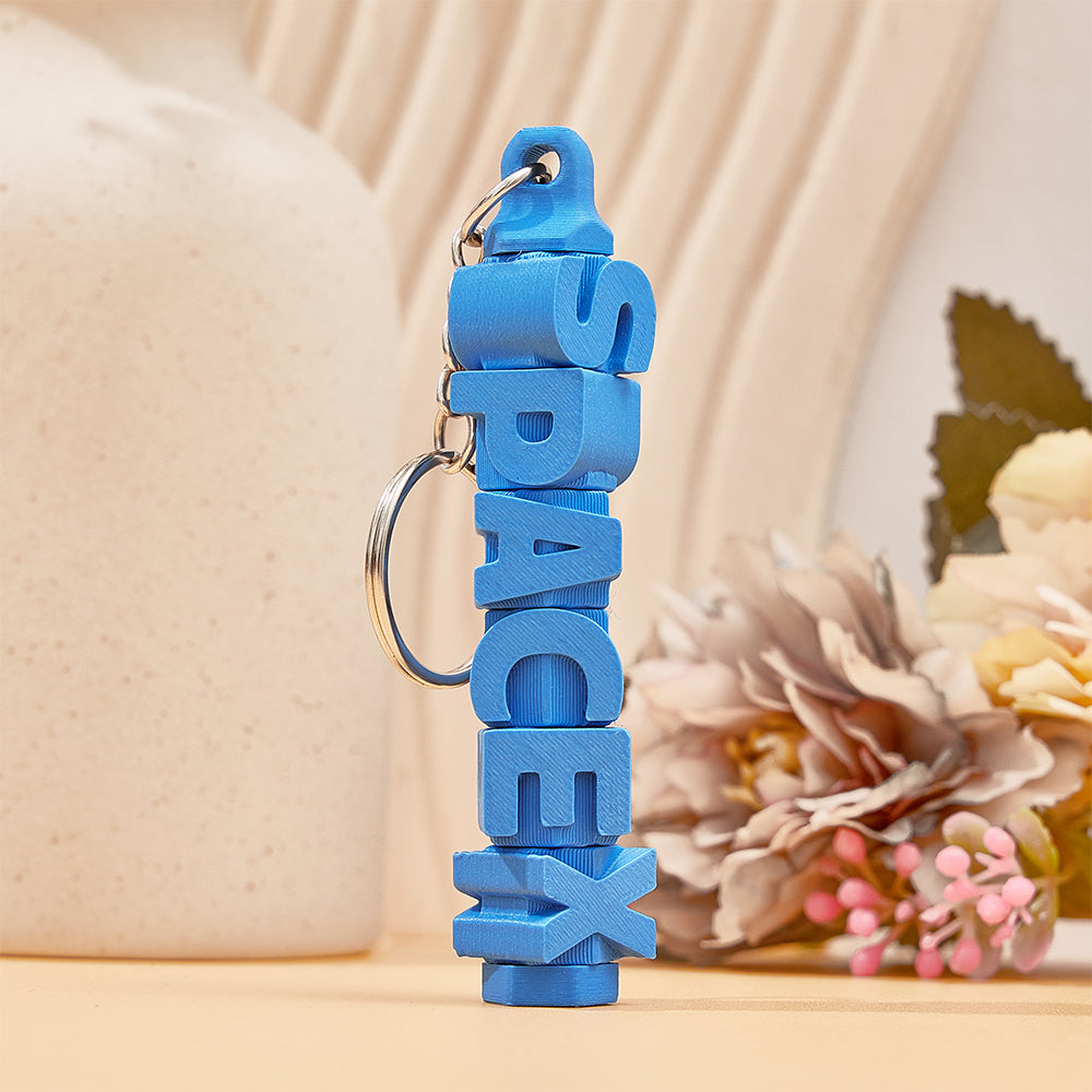 Personalised name keychain attached to a bag zip – colourful 3D printed custom tag for quick luggage identification