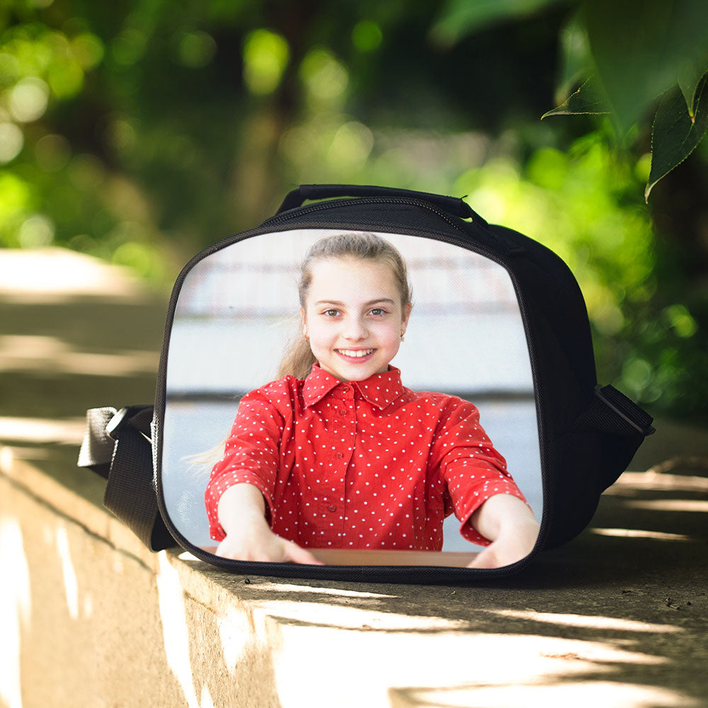 External 8×5 inch pocket of personalised lunch bag holding phone, cards and keys — handy school organisation