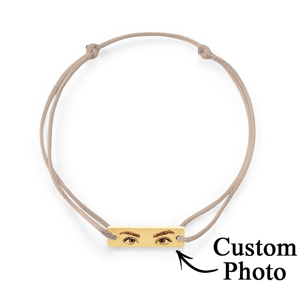 Comparison image showing engraved baby eye and adult eye options for custom engraved personalised bracelet
