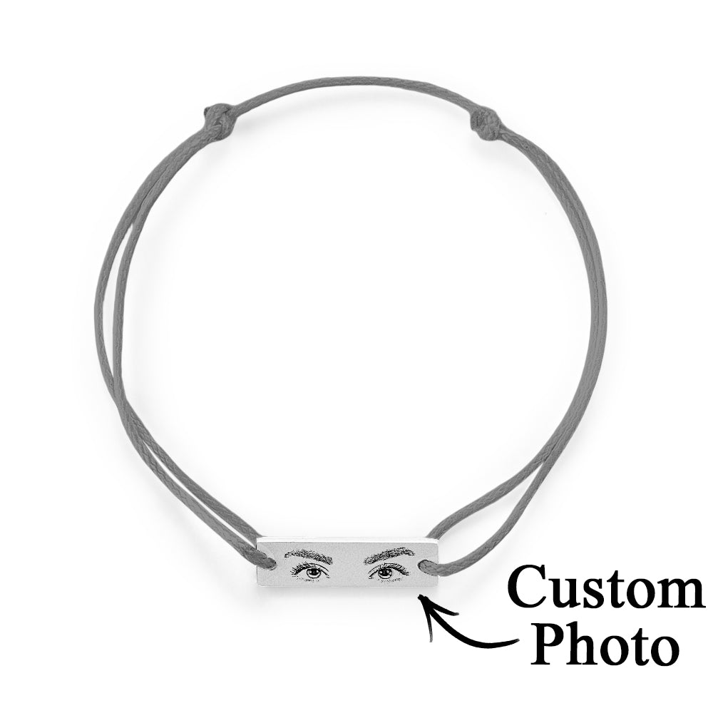 Craftsmanship close-up showing precision micro-engraving process used for the personalised eyes photo bracelet