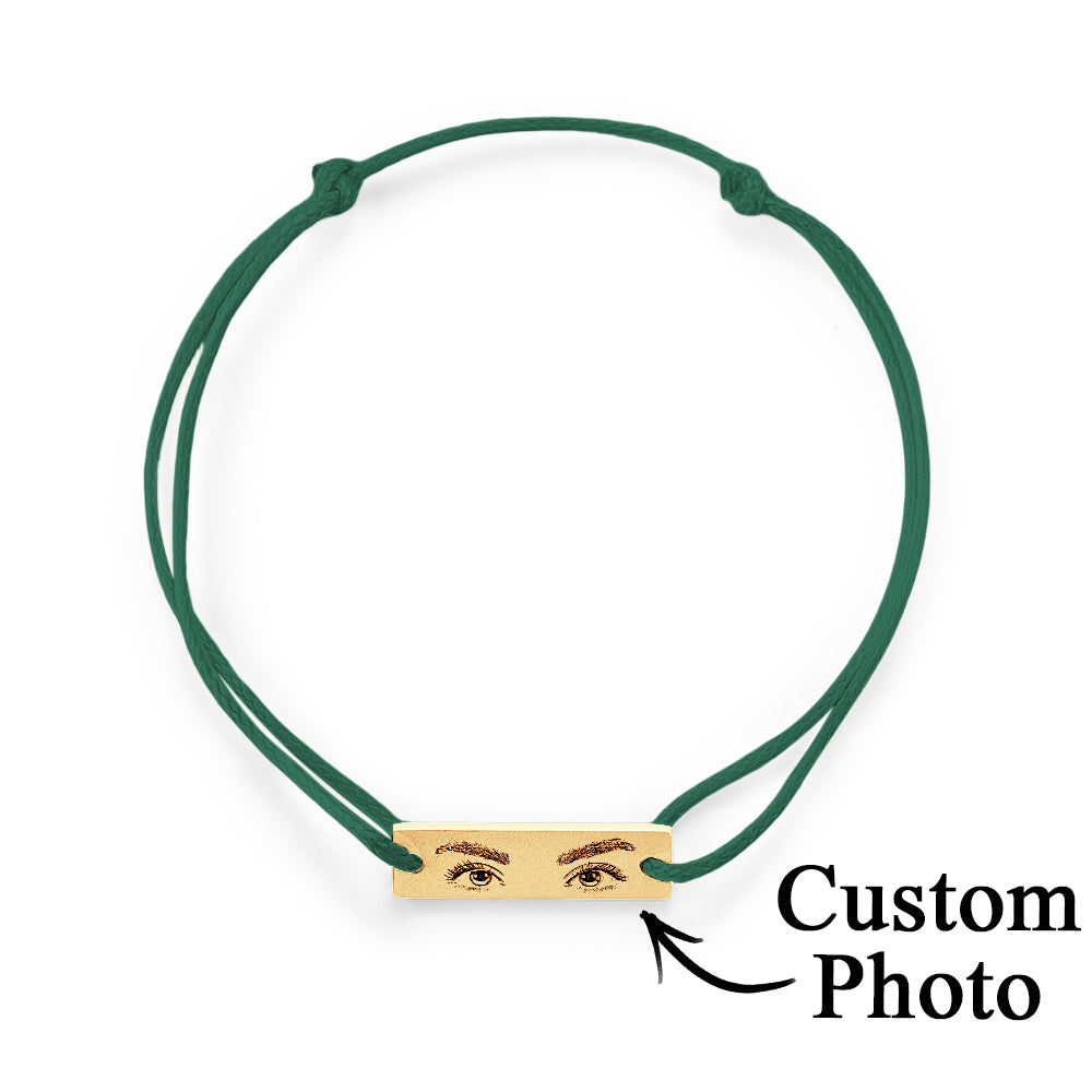 Personalised Eyes Photo Bracelet displayed beside a photo used for engraving, emphasising customisation process