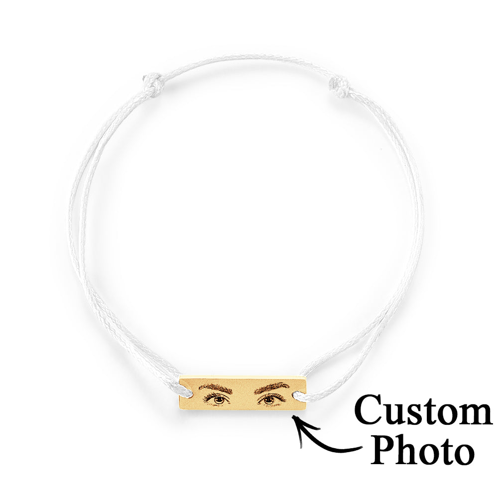 Scale image showing the 2.2 x 0.6 cm charm beside a ruler to illustrate personalised bracelet charm dimensions