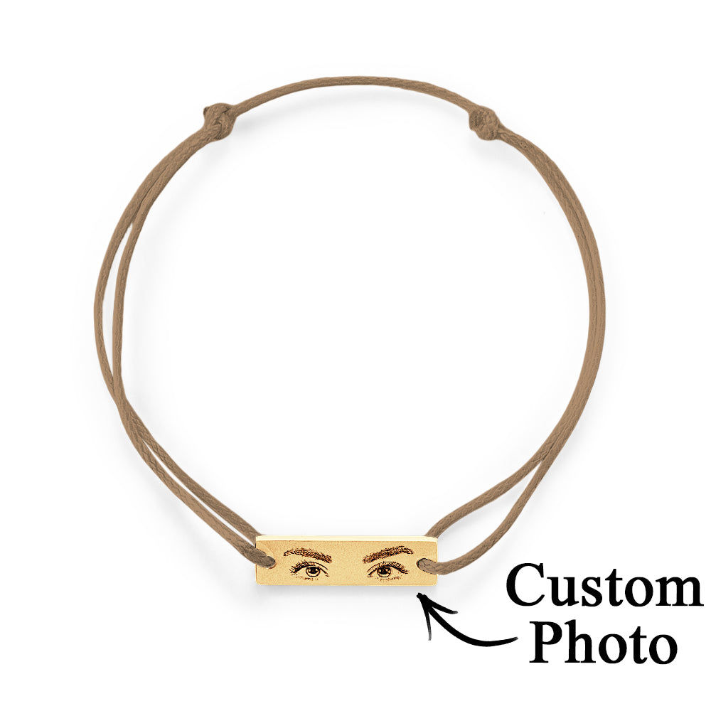 Final product shot showing the personalised eyes photo bracelet in full — adjustable, custom engraved and ready to gift