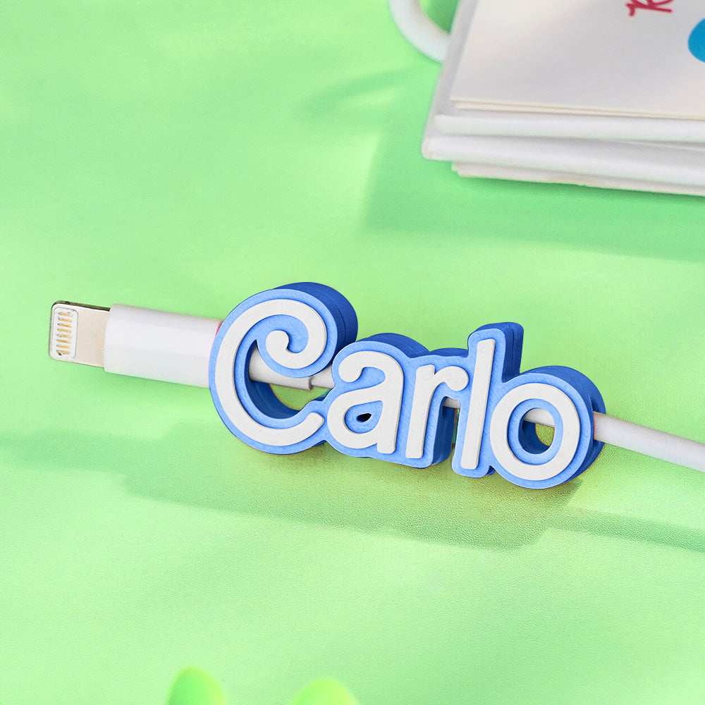 Gift-ready concept image showing the personalised name cable organiser for desks.