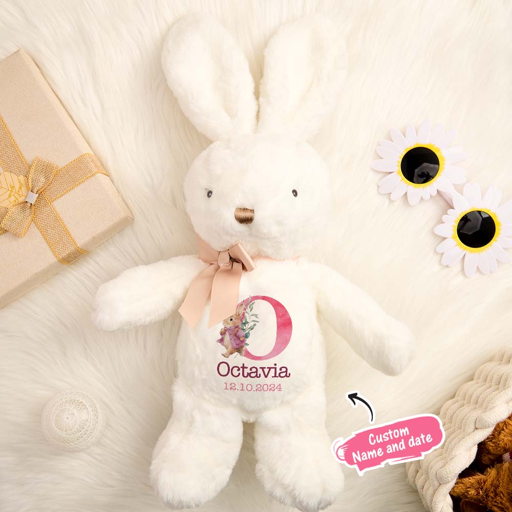 Personalised bunny plush toy in pastel outfit with custom name, charming nursery decor and keepsake for infants
