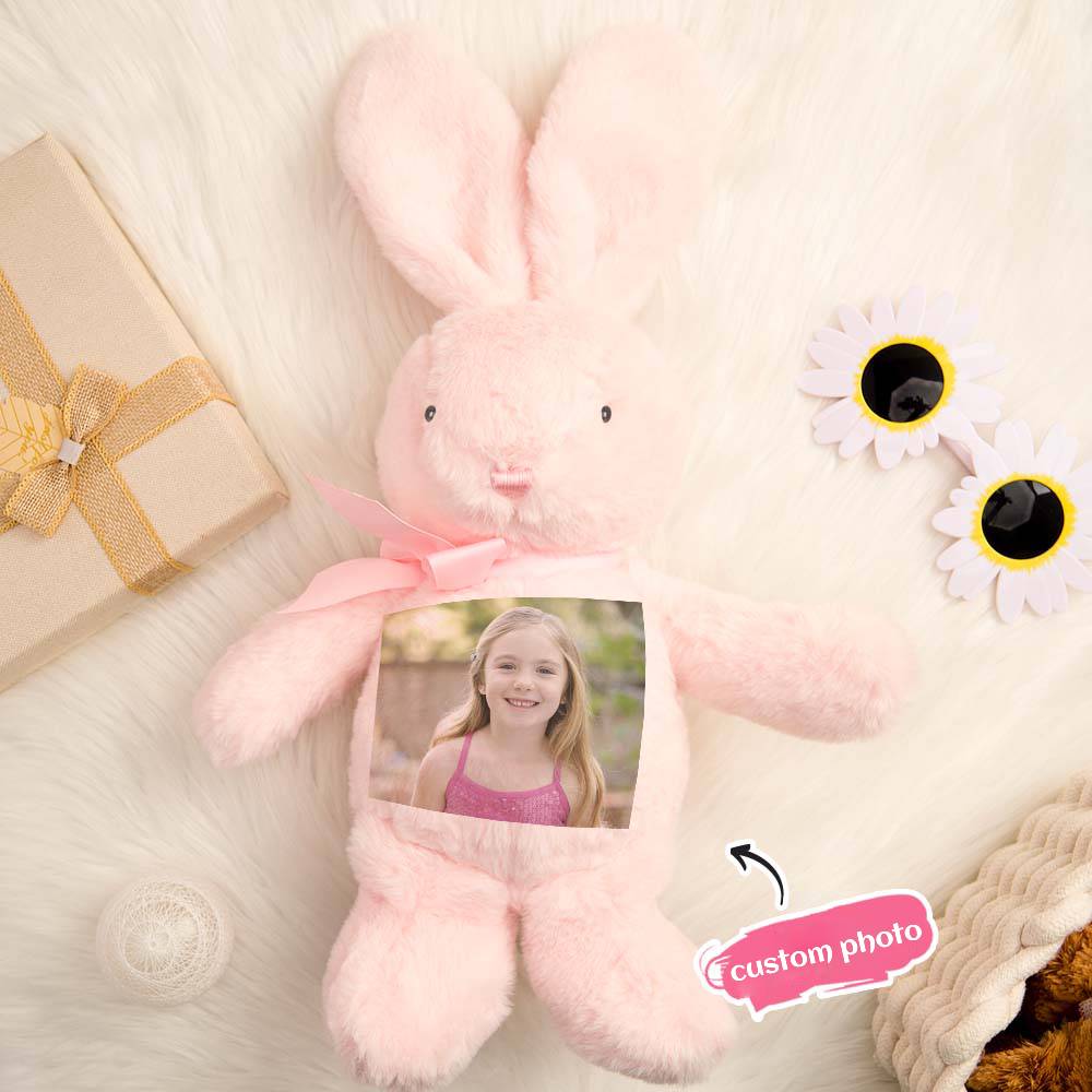 Personalised rabbit plush displayed in a cot setting, charming custom name soft toy for nursery décor