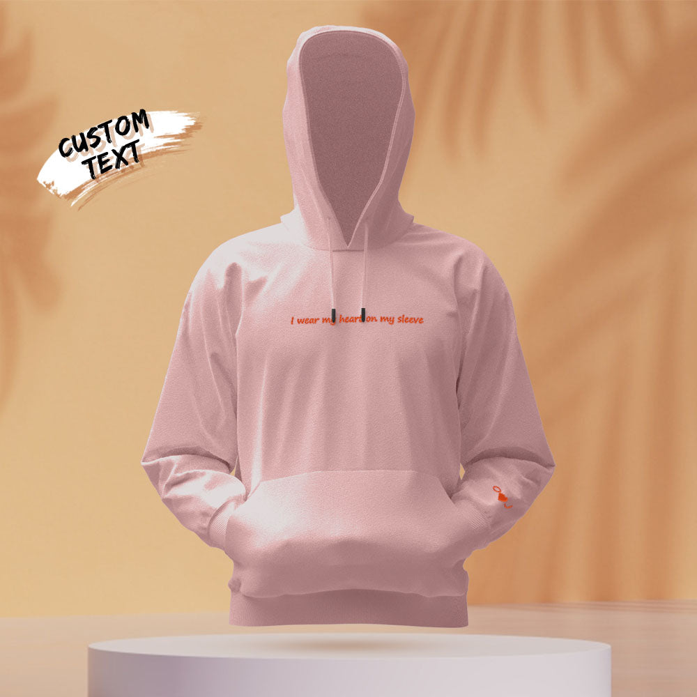 Styled look of matching personalised 'Heart On My Sleeve' hoodies for couples — a coordinated gift idea
