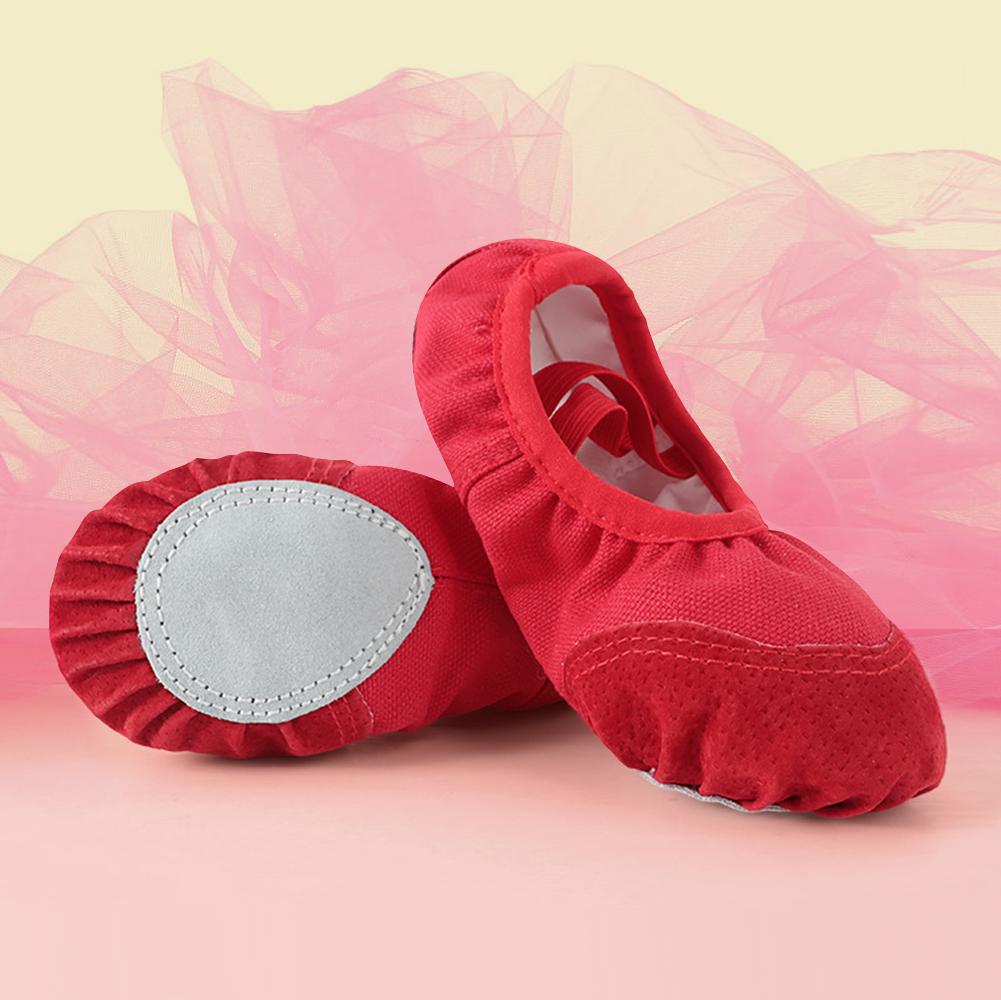 Tan canvas split sole ballet shoes side view highlighting professional soft split sole flexibility and lightweight construction for dance and gymnastics