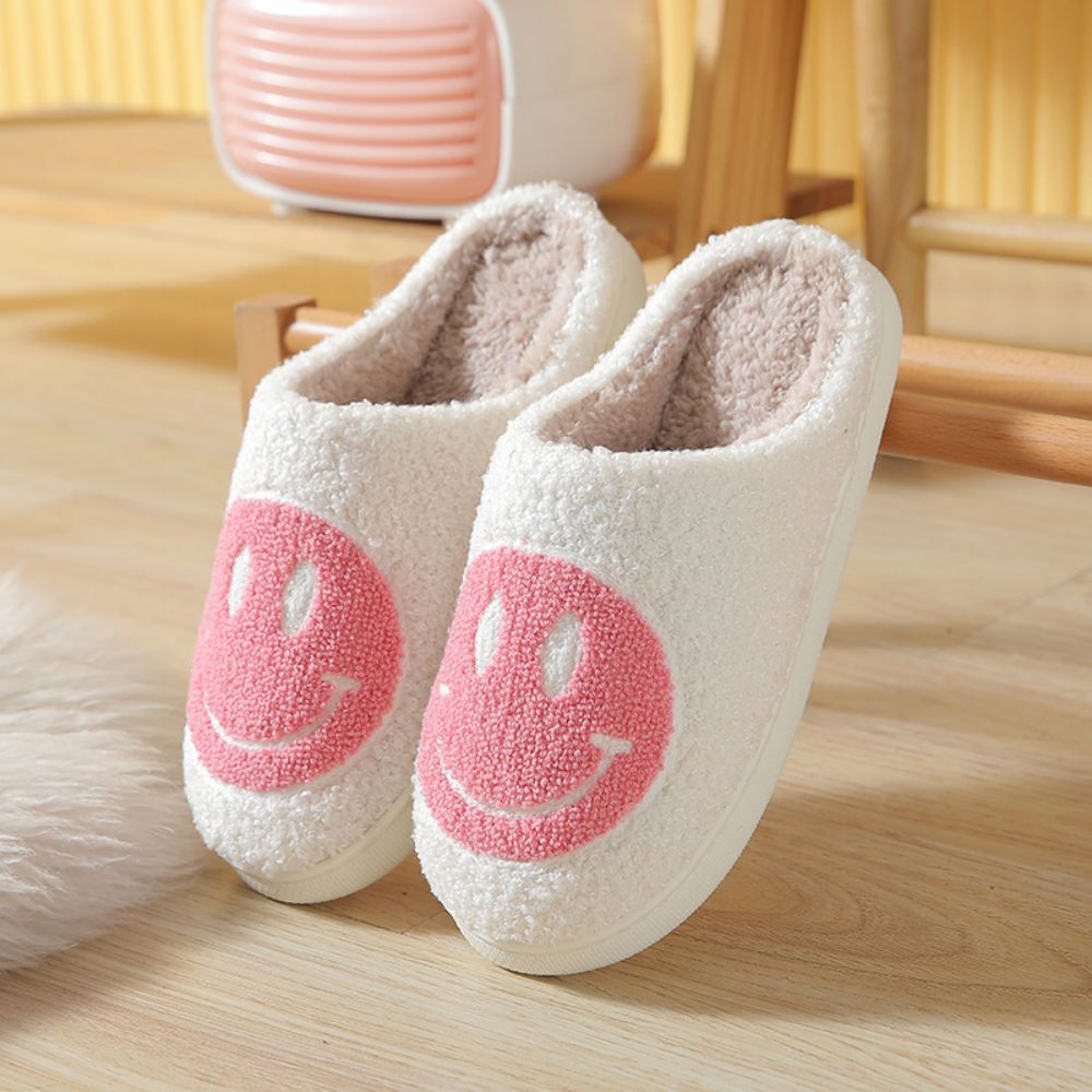 Assorted angle views of Smiley Face fuzzy cotton slippers showcasing fluffy design, smile motif and cosy interior lining