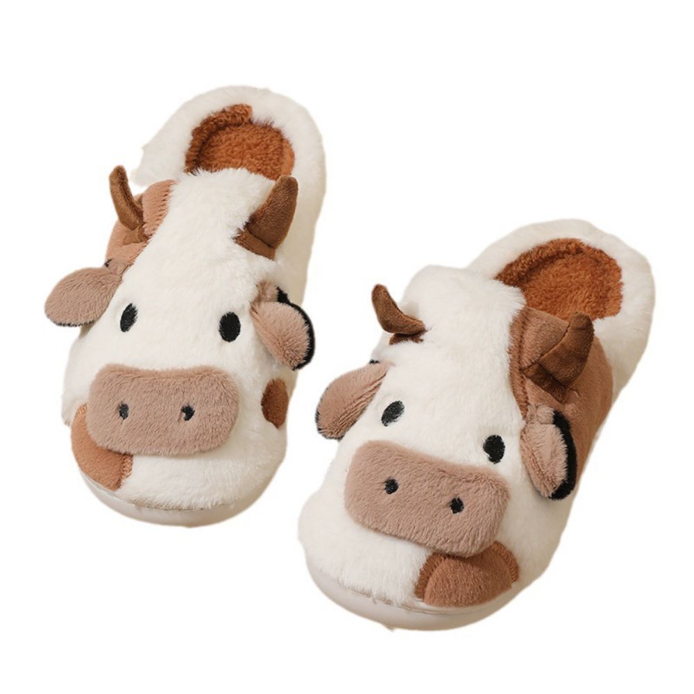 Underside view showing anti-slip rubber tread on cow cotton cartoon slippers for safe use on wet floors