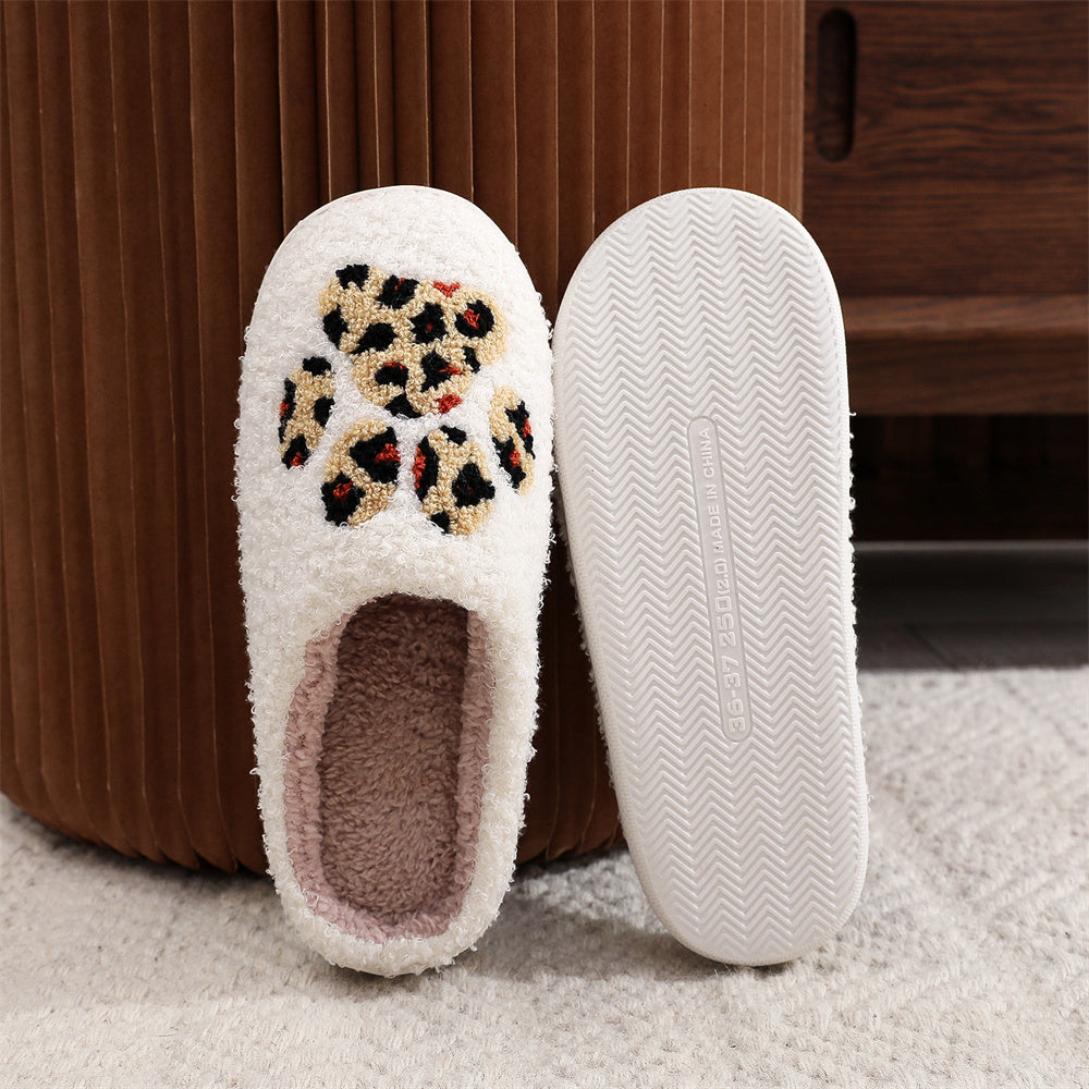 Angled view of open-back slip-on Christmas leopard paw-print slippers with soft, skin-friendly cotton-like upper — indoor footwear