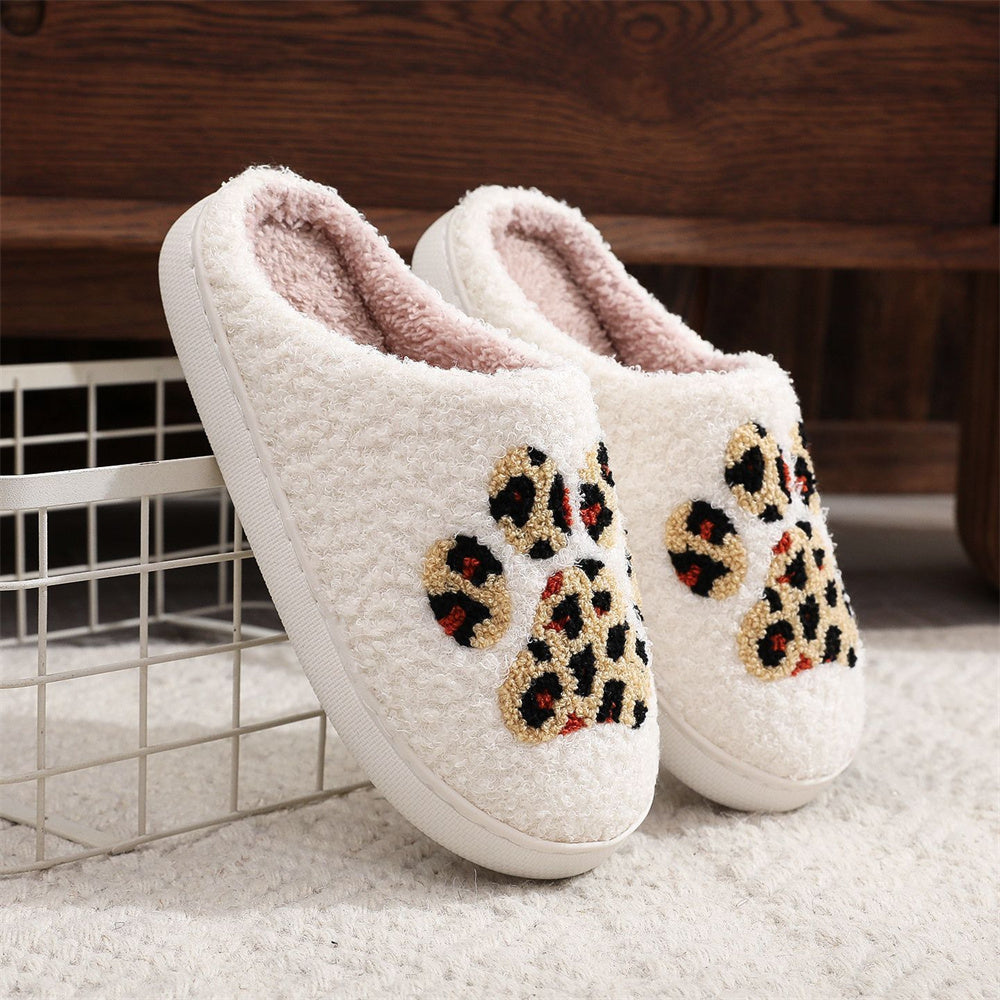 PVC sole detail of Christmas leopard paw-print cosy slippers showing textured non-slip pattern for light indoor use