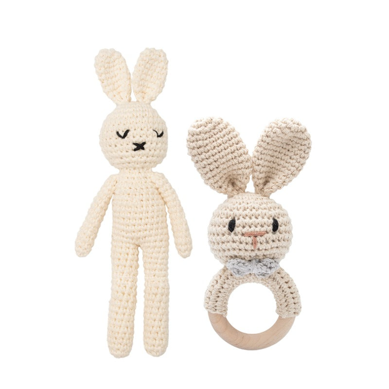 Gift-ready presentation of a handmade knitted rattle with tag – perfect for baby showers, christenings and birthdays