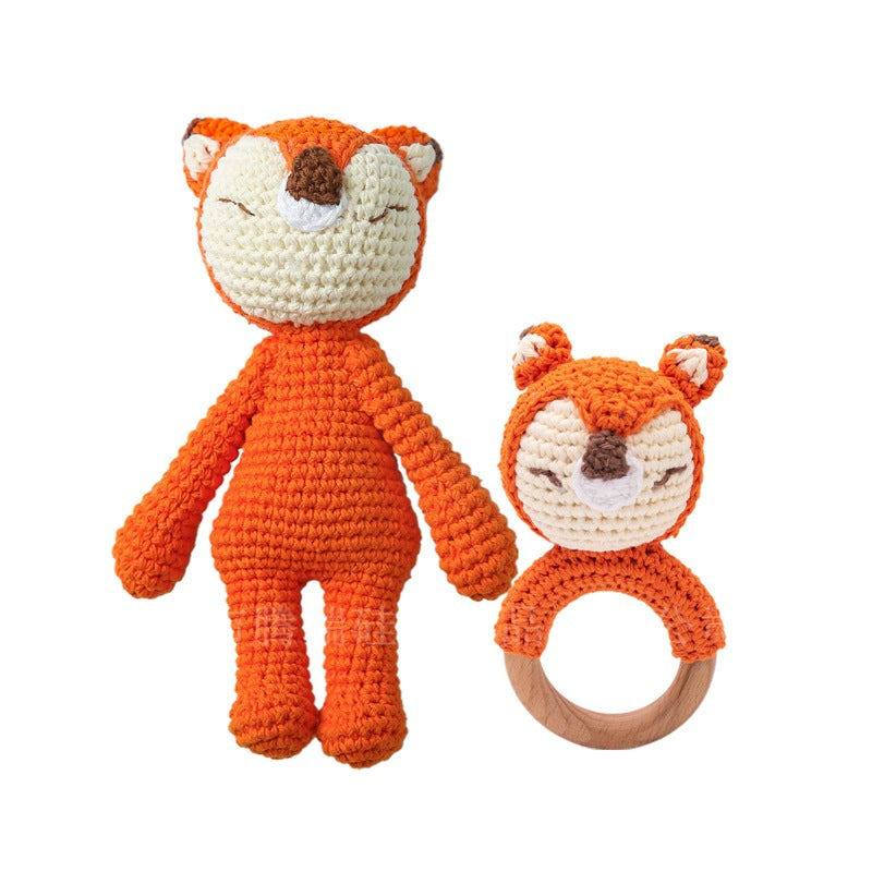 Nursery lifestyle image showing knitted animal rattle as a calming newborn comforter and gentle sensory friend