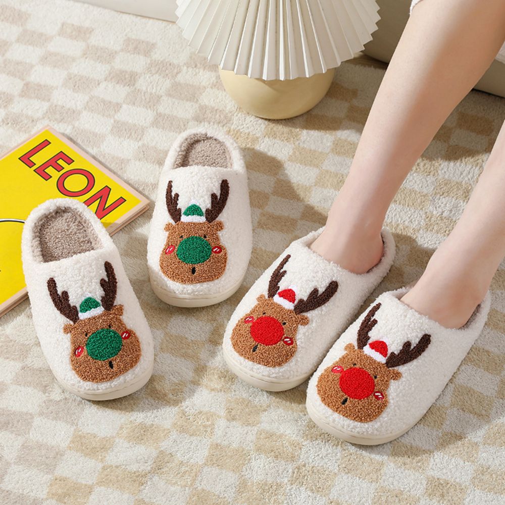 Close‑up of reindeer decoration and skin‑friendly plush texture on Christmas Reindeer Plush Slippers, highlighting cute festive detail
