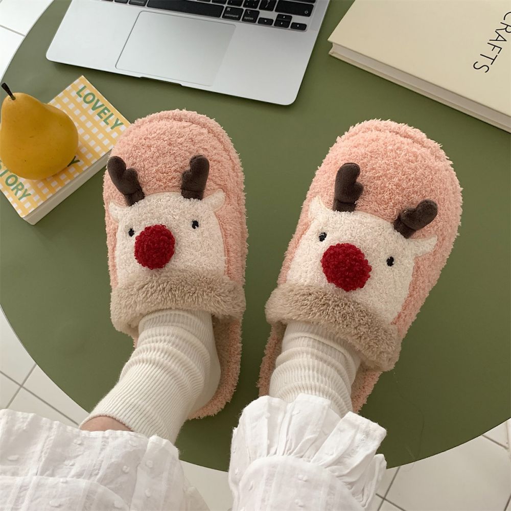Side view of Christmas Elk Plush Slippers showing soft plush upper, playful elk decoration and easy open-front slip-on design — ideal festive indoor footwear