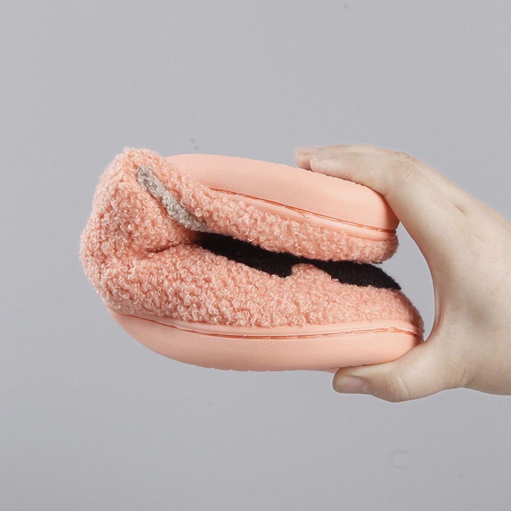 Top view of Halloween Pumpkin Slippers showing roomy unisex fit and cushioned cotton‑style interior for comfortable home wear
