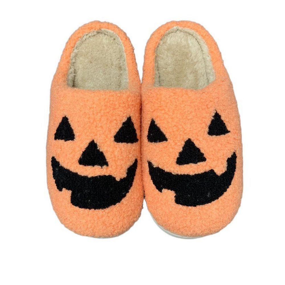 Close-up of soft foam pumpkin slipper detail — plush texture, secure fit and slip-resistant sole for comfortable indoor Halloween wear