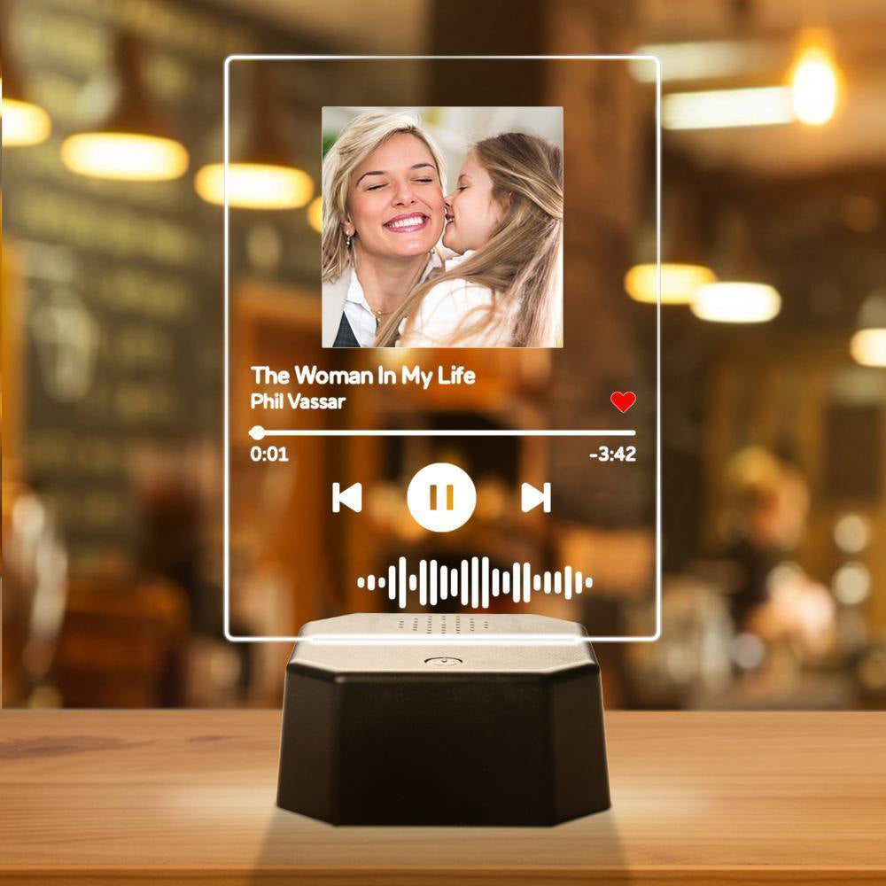 Illuminated personalised Spotify Code LED lamp in use, lights synchronise to music with vivid UV‑printed colours on the acrylic plaque