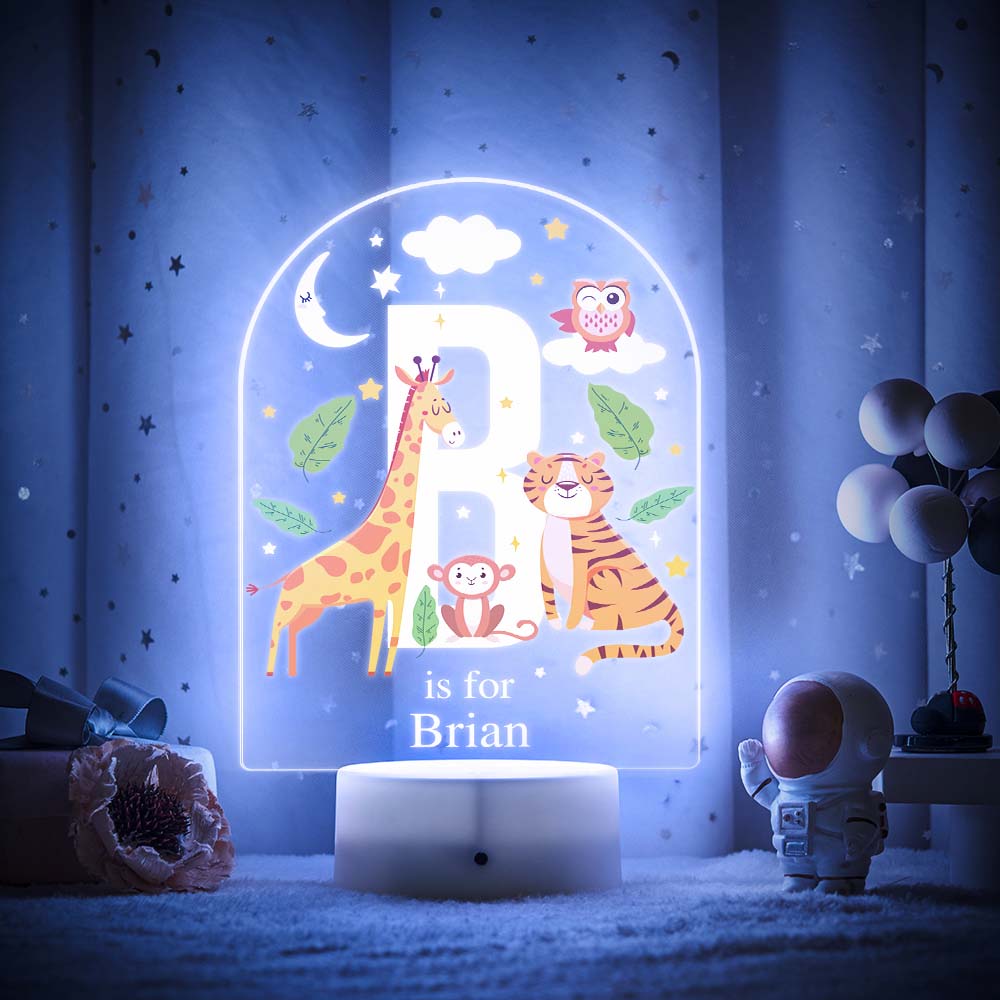Engraved acrylic slide showing animal alphabet 'A' design with custom name example — personalised LED nursery lamp