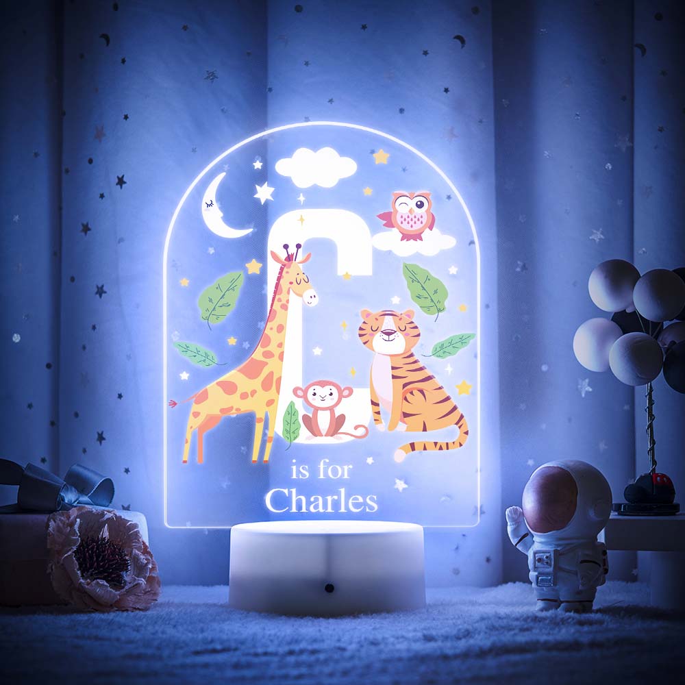 Engraved acrylic slide showing animal alphabet 'B' design with custom name example — personalised nursery light