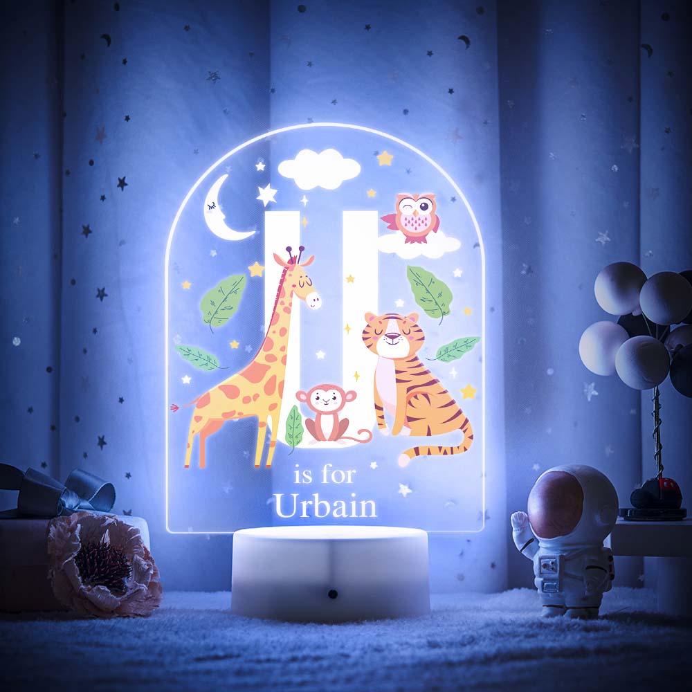 Engraved acrylic slide showing animal alphabet 'T' design with custom name example — personalised LED night light