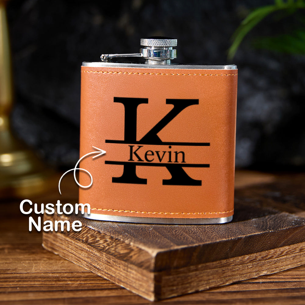 Personalised leather-wrapped 6oz (180ml) stainless steel whisky flask with engraved initials and stitched PU leather finish, front product shot — engraved gift for him