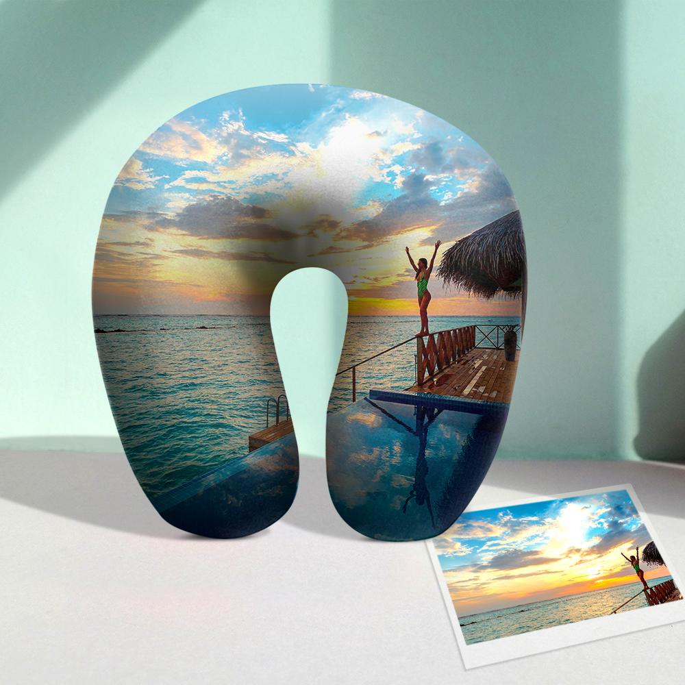 Detail view of the memory-foam travel neck pillow with a printed photo on the front pillowcase.