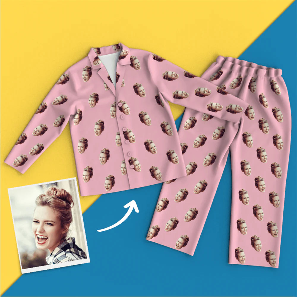 Model lounging in colourful personalised face pyjamas — unisex relaxed fit long‑sleeve top and bottoms, perfect for cosy nights in or novelty party pyjamas