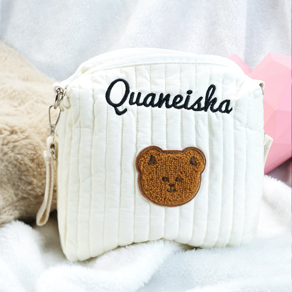 Interior pockets and compartments of the Personalised Stroller Hanging Bag, a premium cotton pushchair organiser.
