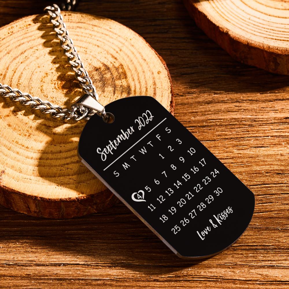 Double-sided engraved dog tag showing a clear photo on one side and a customised calendar with name on the reverse — personalised memorial or anniversary gift