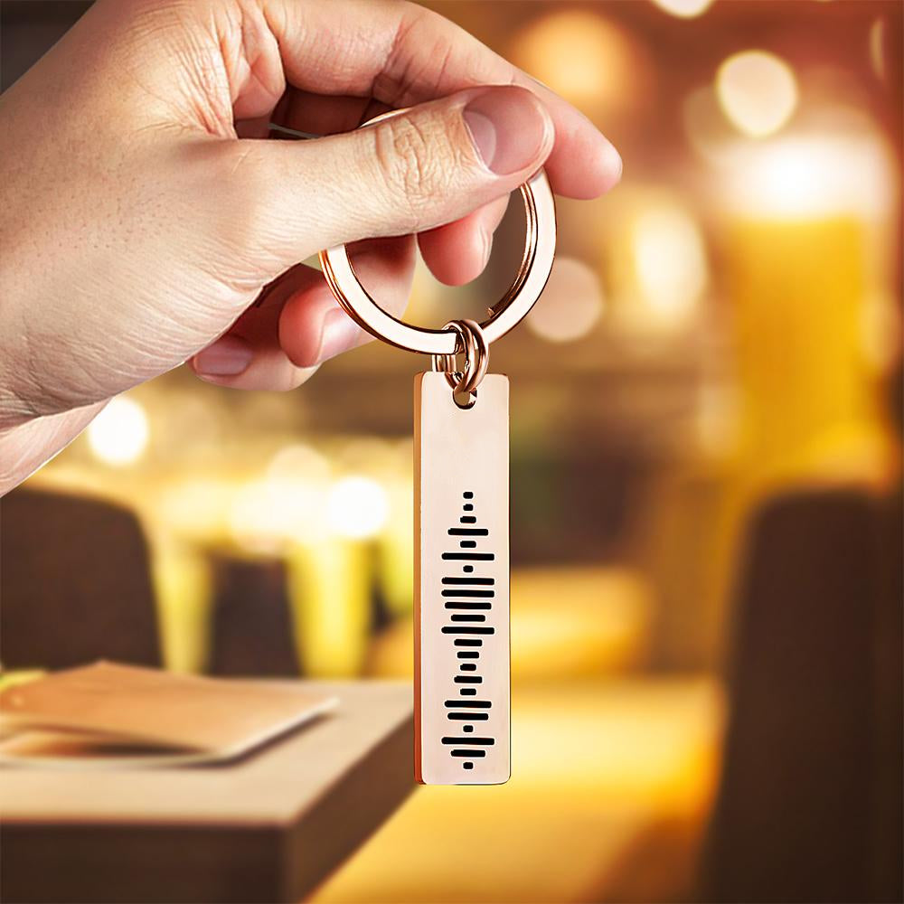 Collection of personalised engraved music code keychains displaying different names and quotes – bespoke Spotify song keyrings for gifts