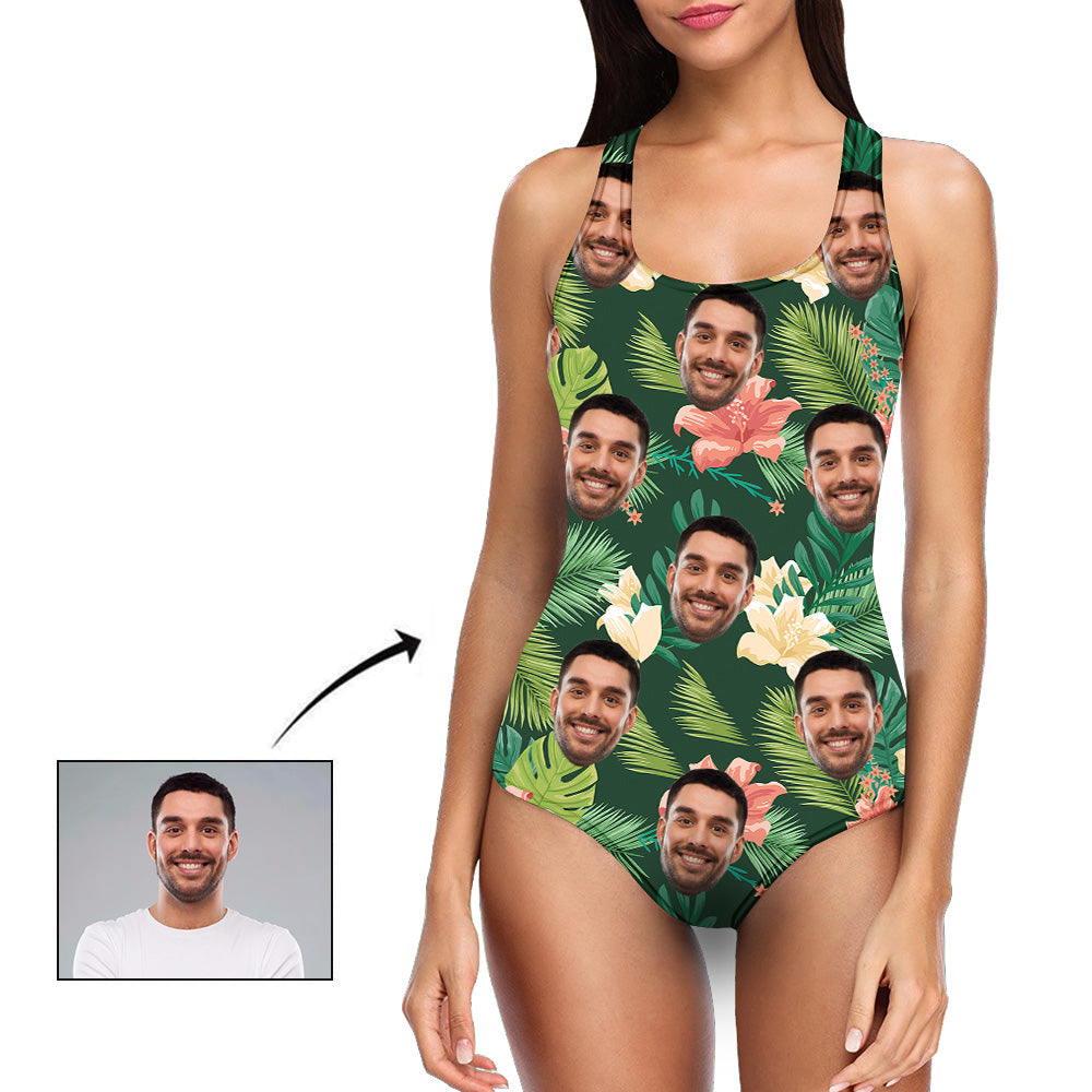 Model wearing personalised tropical one‑piece swimwear, showing comfortable fit, removable chest pad and resort‑ready tropical print