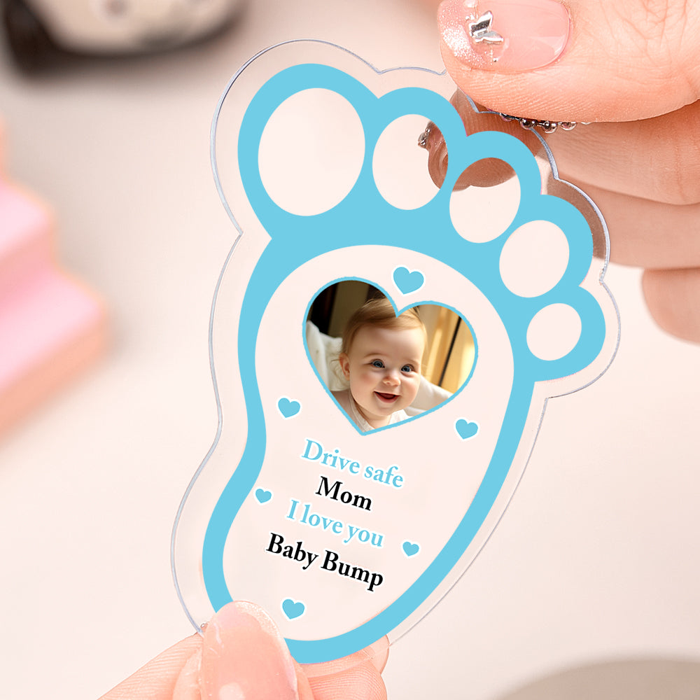 Long view of drive safe baby footprint charm with dimensions 3.35 x 2.36 inches.