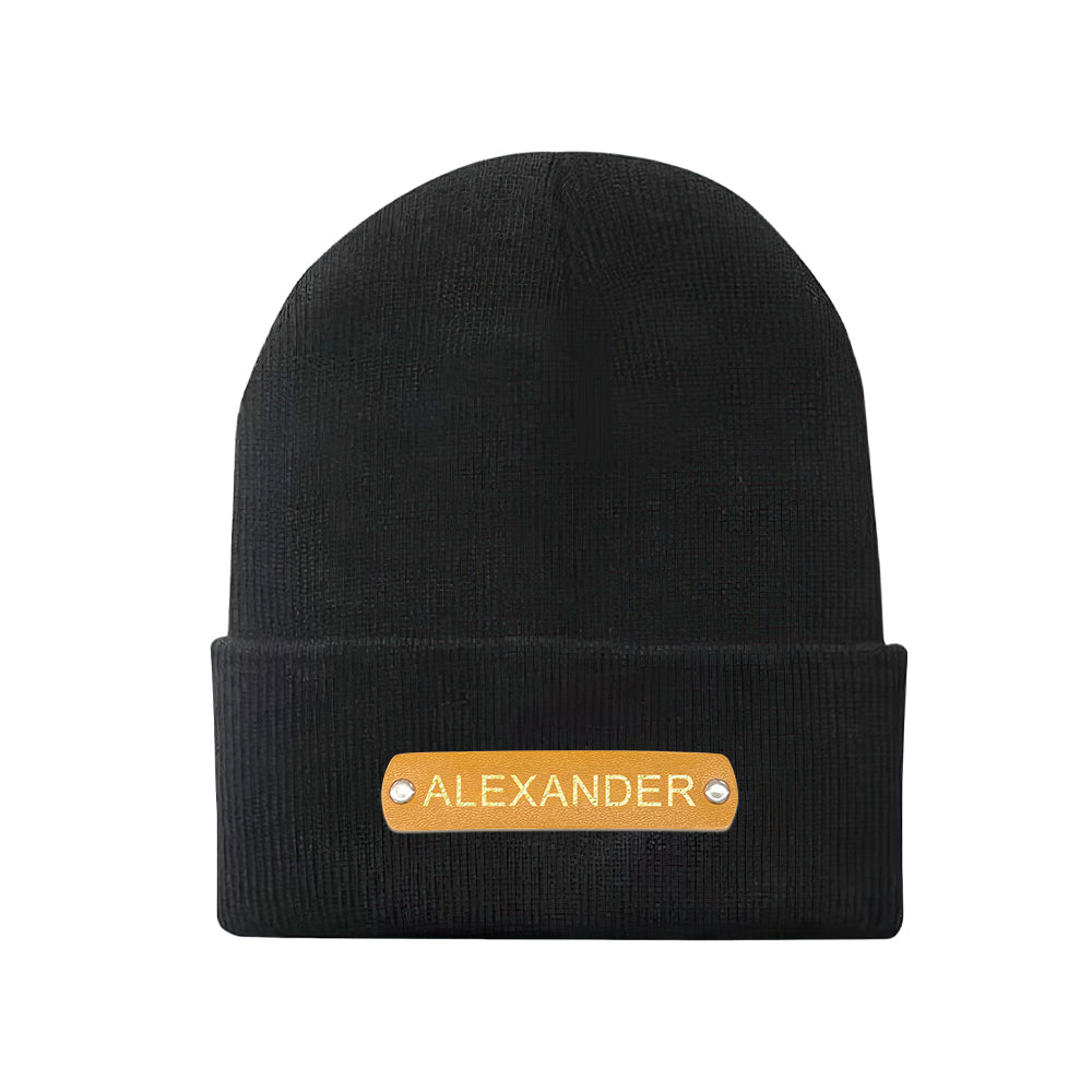 On-model lifestyle shot of custom name winter hat with leather name patch, cosy acrylic beanie for everyday outdoor wear