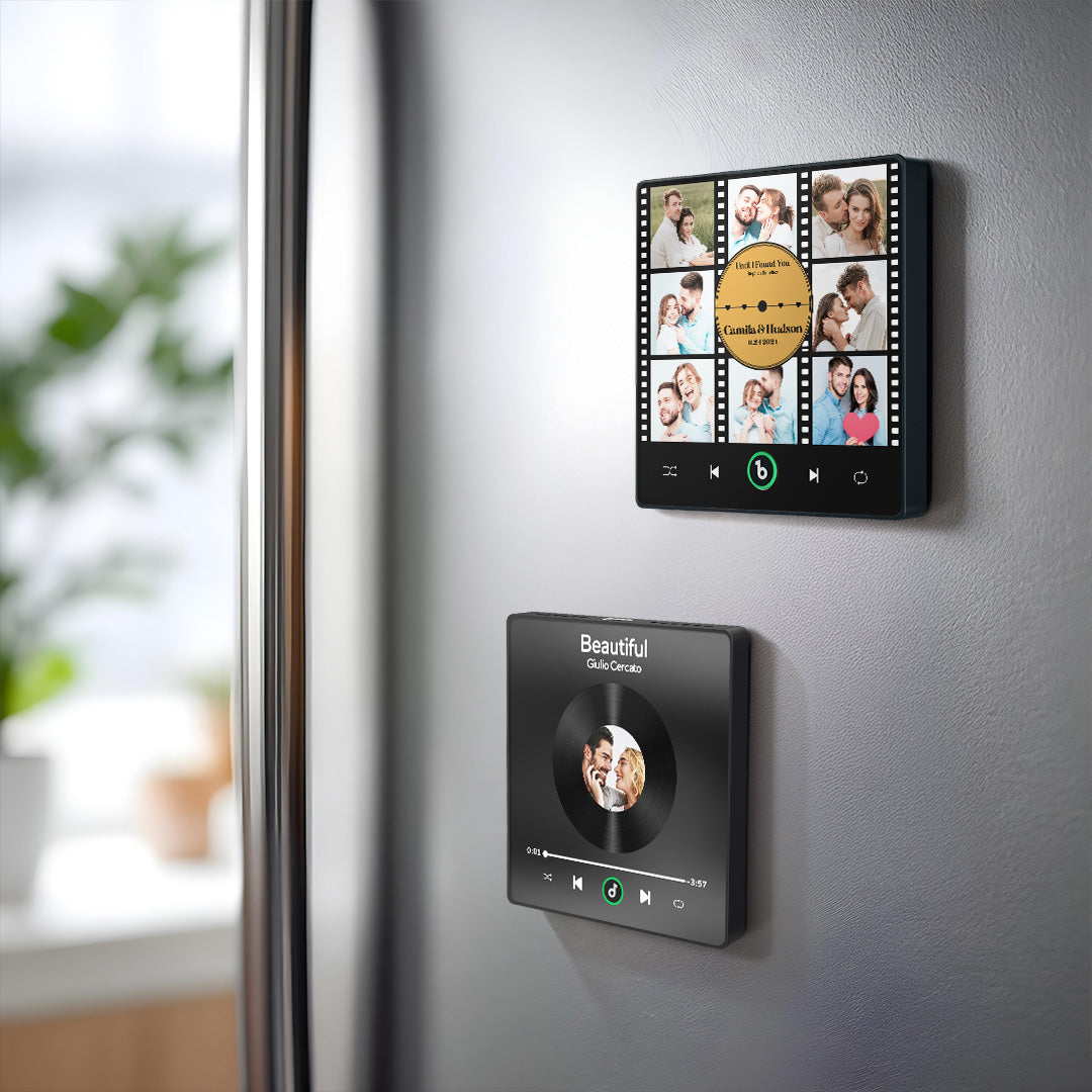 FridgeBeats Framed 4.0 attached to a stainless fridge in a kitchen — personalised magnet that plays a custom song, ideal housewarming or wedding gift