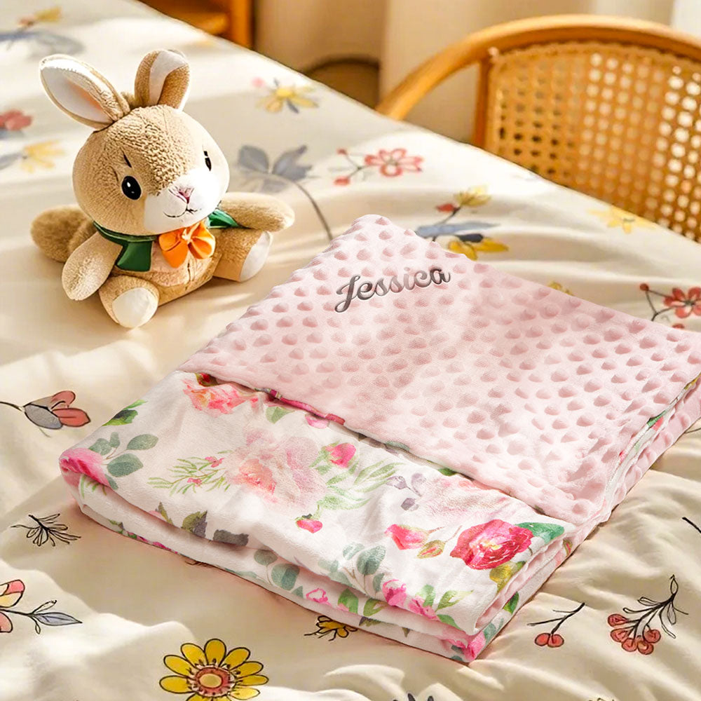 Velvet baby blanket laid flat, highlighting size and silky texture