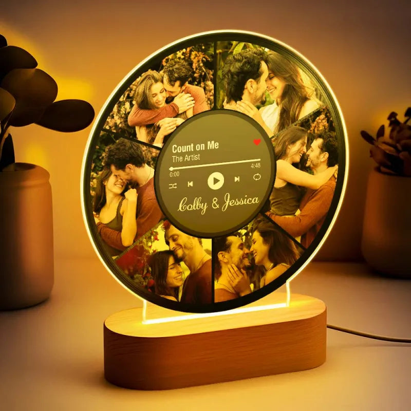Close up of personalised LED photo lamp lit with warm ambient light showing etched photos on premium acrylic — custom photo collage night light, ideal gifts for couple