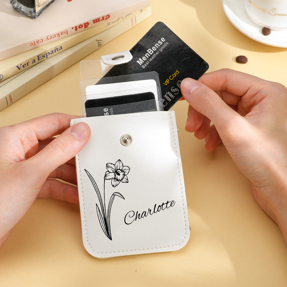Pull-out card holder extended from personalised birth flower mini wallet showing quick-access contactless card — compact personalised card holder
