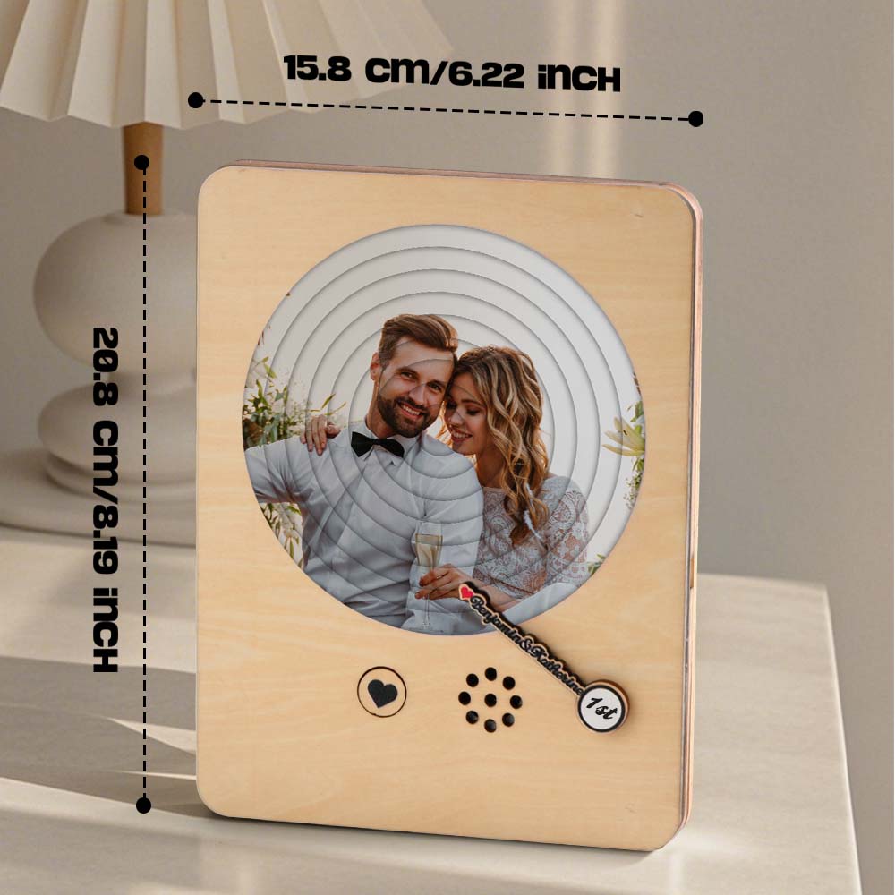Top-down view of custom photo record player showing song control button and space for uploaded MP3