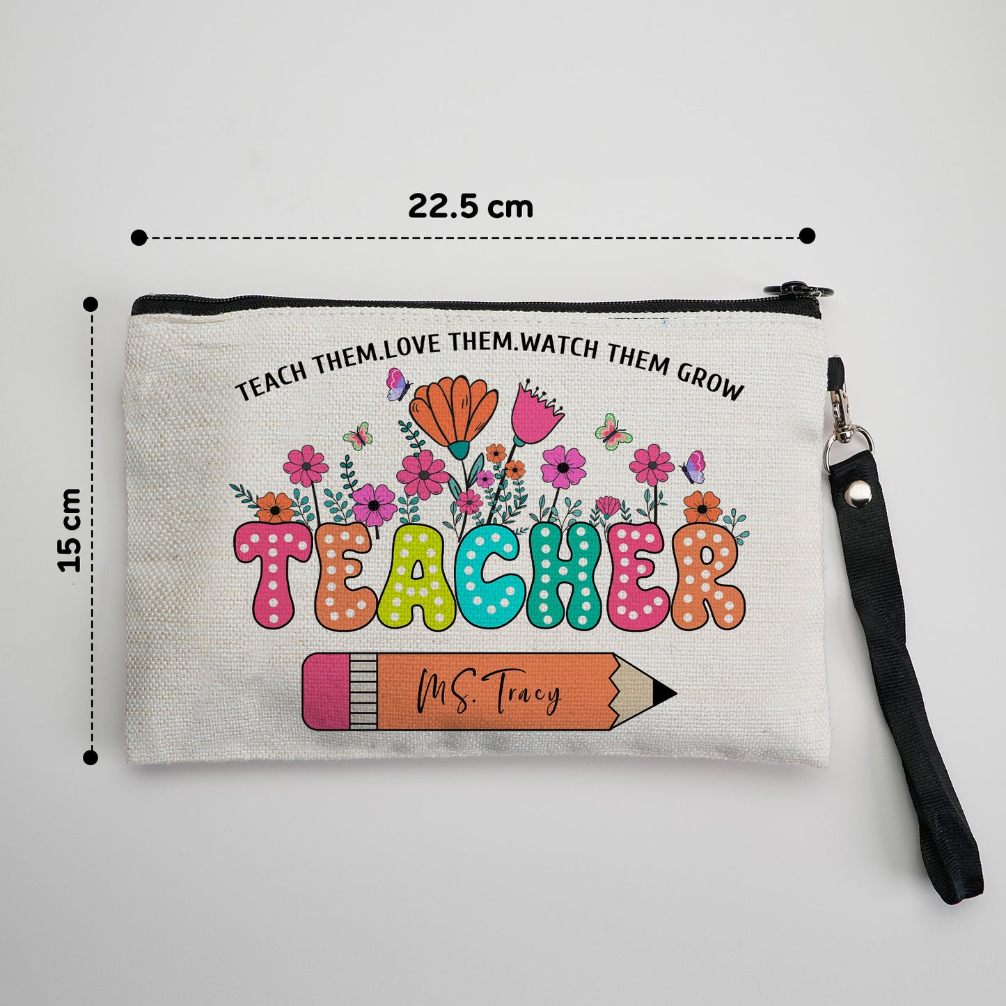 Floral personalised name pouch held as a chic clutch – thoughtful gift for teachers