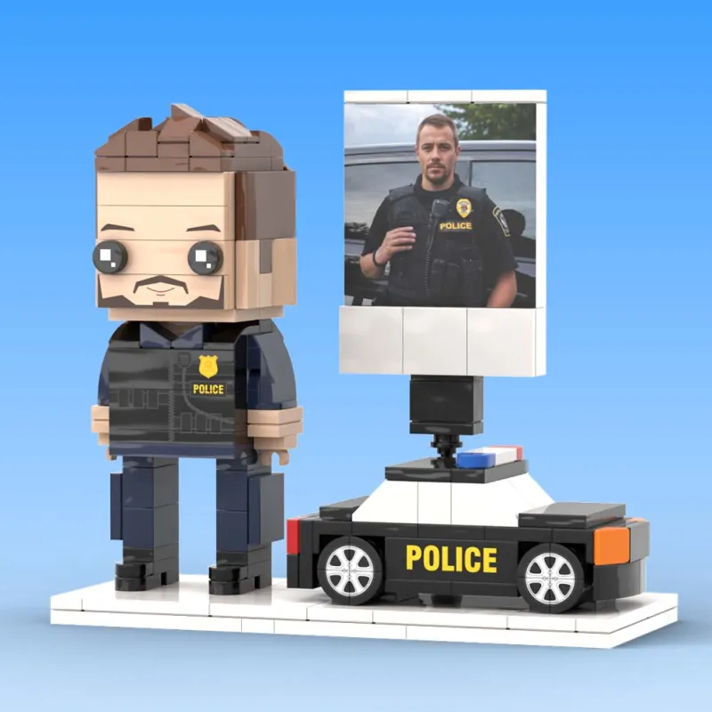 Rear view of personalised full-body brick-style police figure highlighting hairstyle and uniform detailing — bespoke custom mini figure keepsake