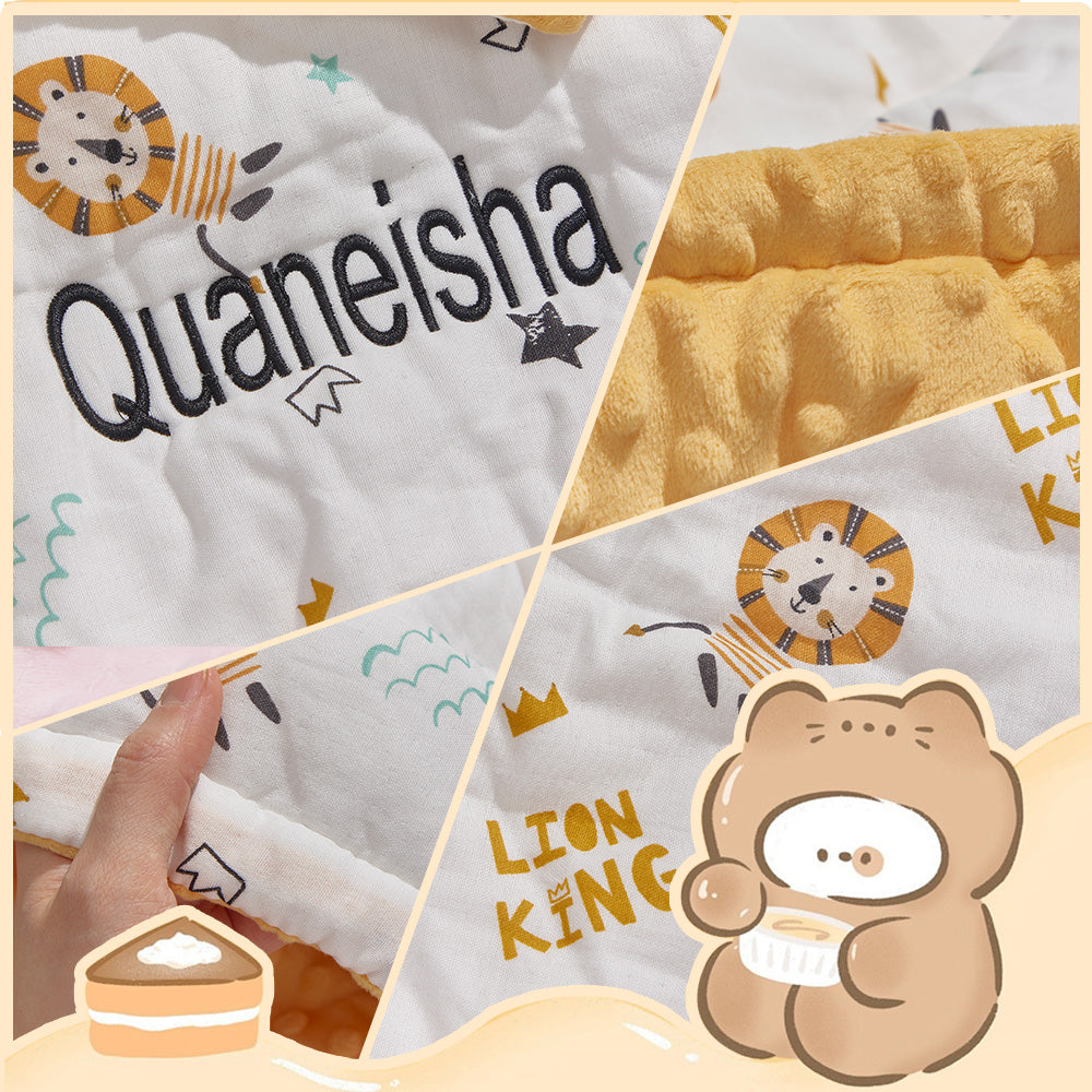 Blanket folded gracefully to showcase size and embroidery details for a nursery gift.