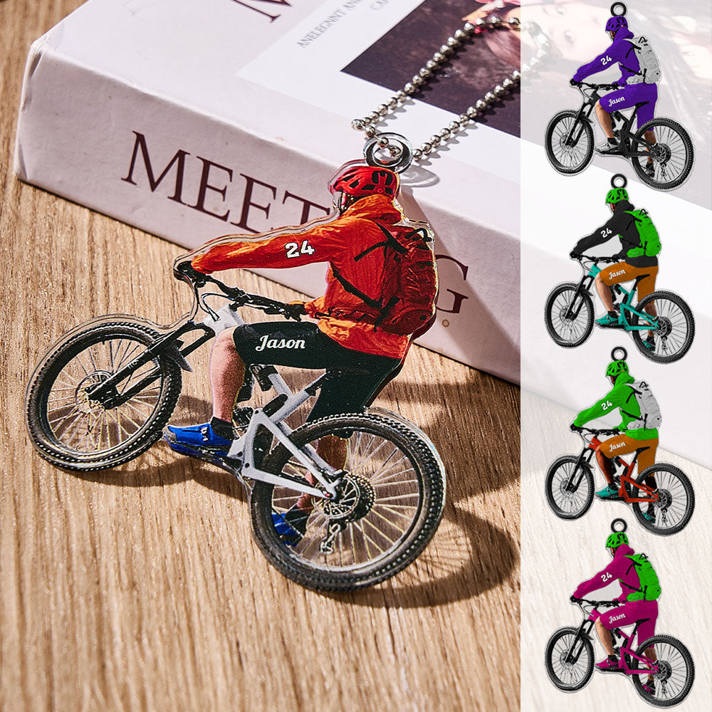 Personalised acrylic cycling ornament on an office desk — engraved biker keepsake and thoughtful gift for cycling lovers