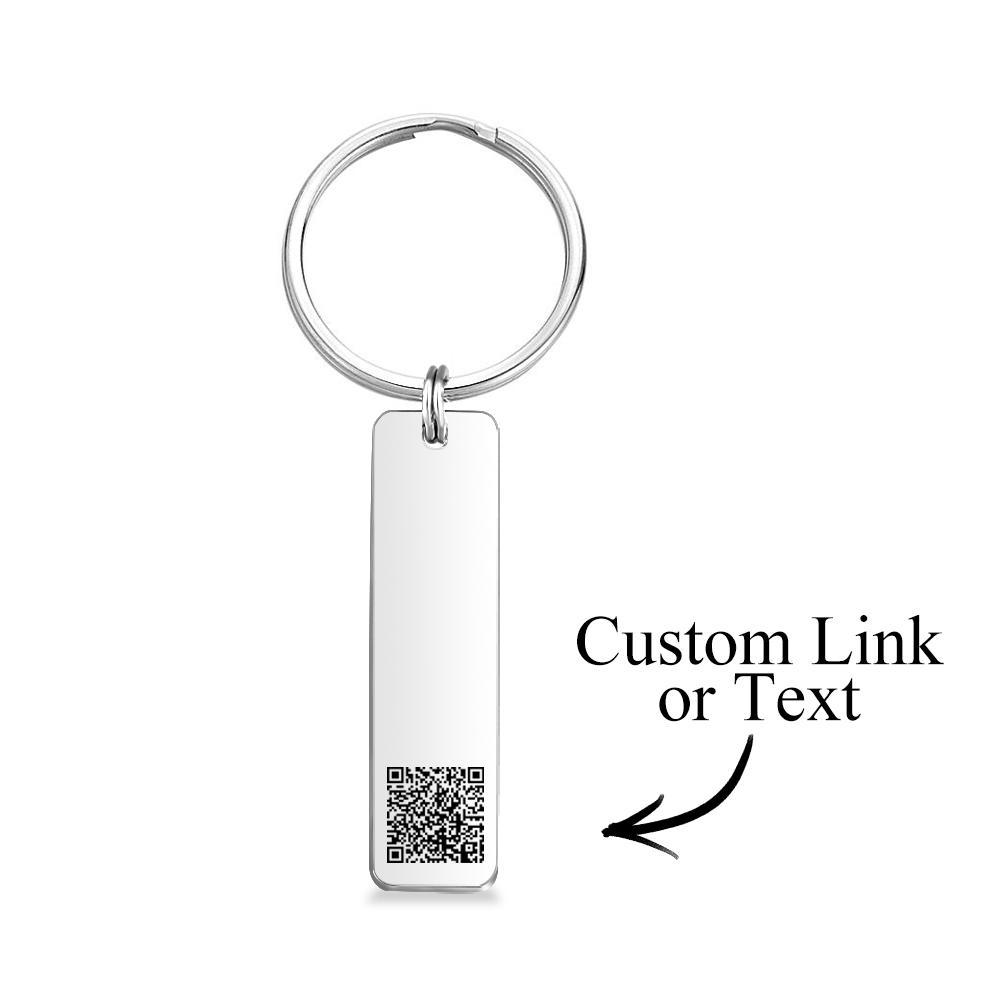 Personalised engraved QR code keyrings displayed in black, silver, gold and rose gold colour options — custom stainless steel keyring keepsakes