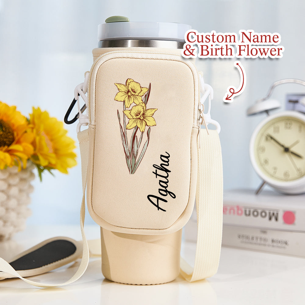 Lifestyle image of woman carrying personalised birth flower Stanley tumbler carrier at a weekend market, thoughtful Mother's Day or birthday gift idea