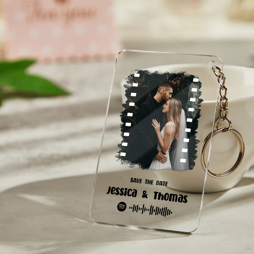 The gift set shown as a polished clear acrylic plaque and keychain with photo and Spotify code engraving.