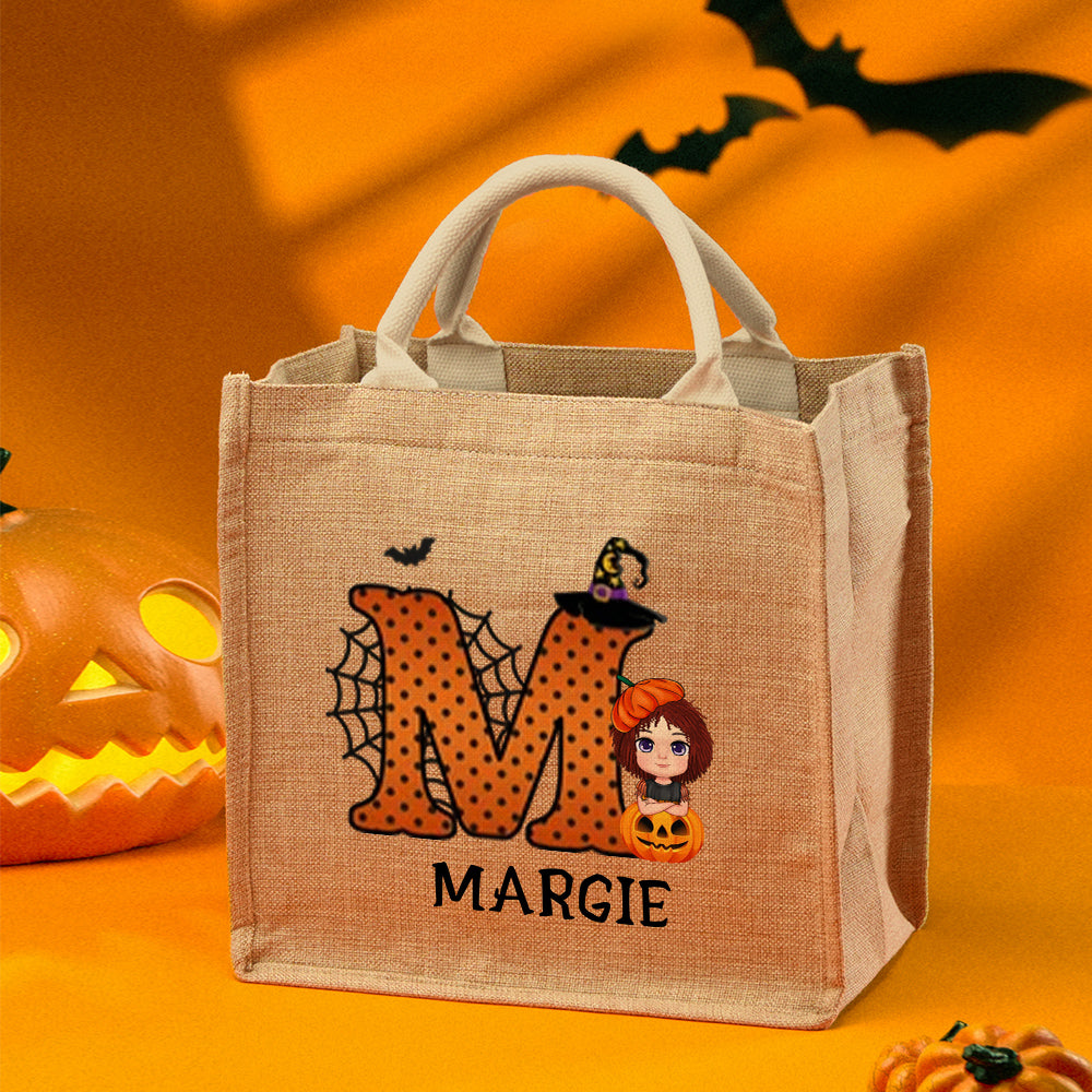 Front view of personalised cartoon pumpkin jute tote showing cheerful pumpkin character and name personalisation