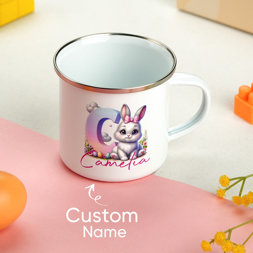 Child holding personalised bunny enamel mug to show 9.3x12cm size — 12oz, perfect for small hands and everyday use