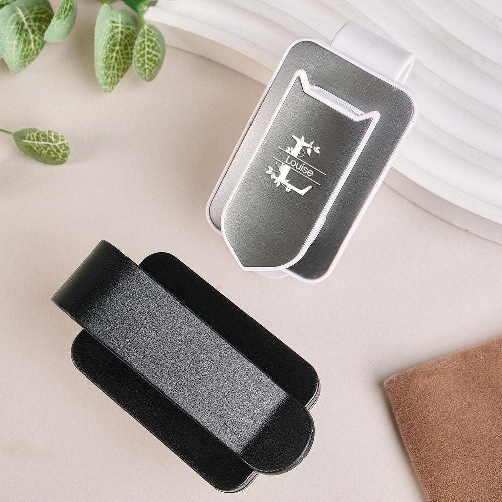Sunglasses securely held by the low-profile car sun visor clip, showing quick reach and unobstructed sightlines.